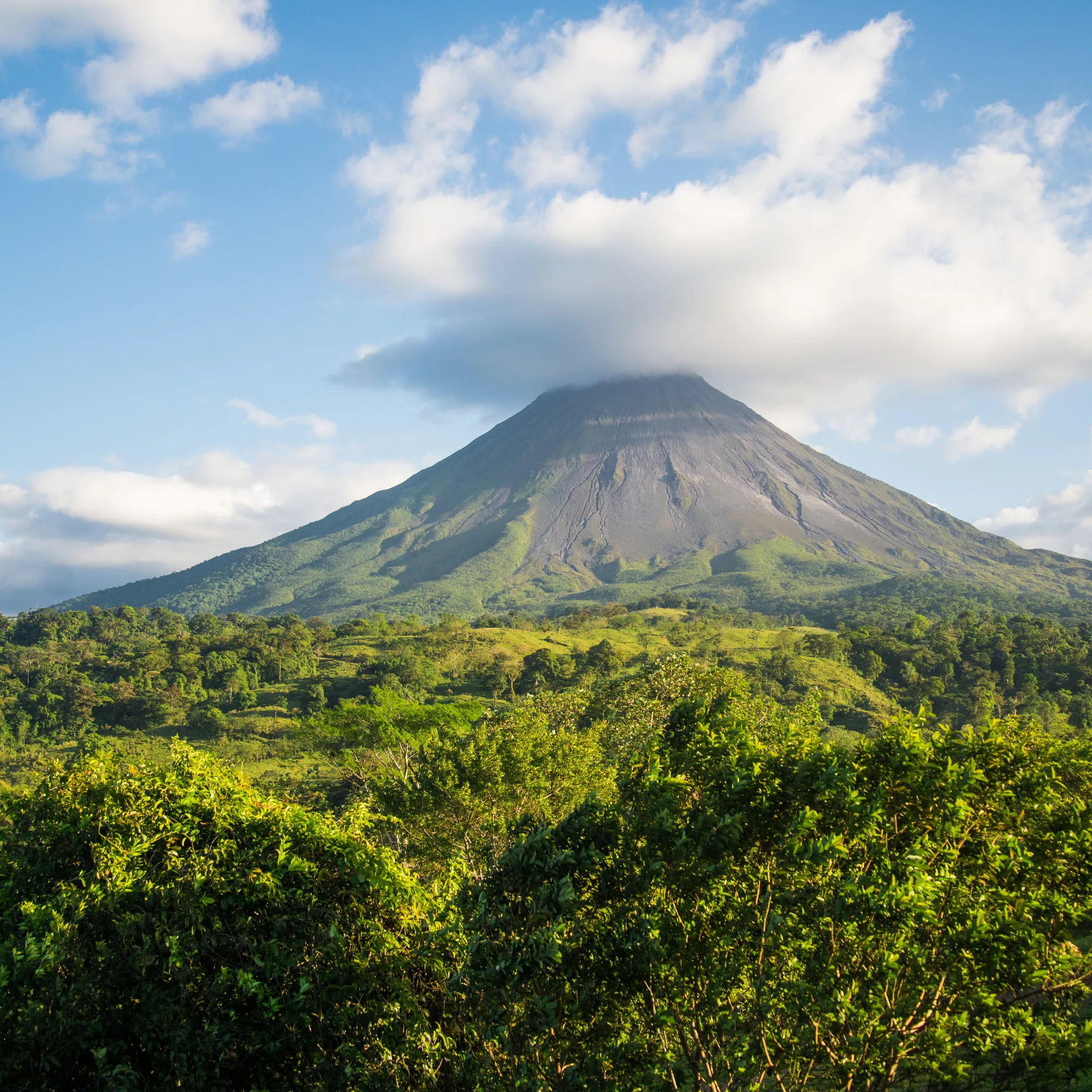 Arenal Volcano and green rainforest landscape near La Fortuna, Costa Rica